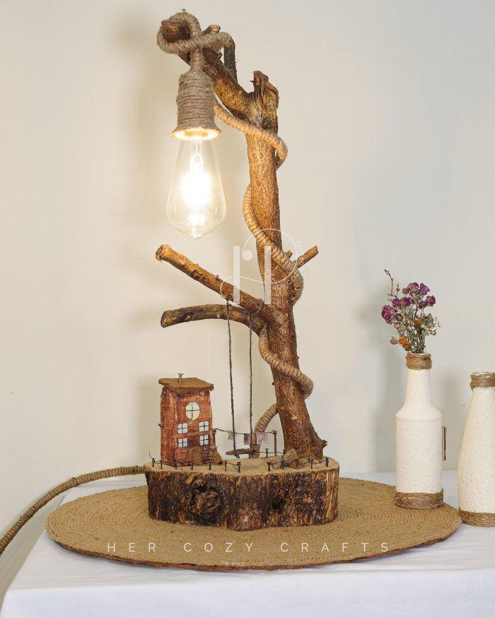 Swing Tower Lamp — Driftwood base with swing and cottage scene