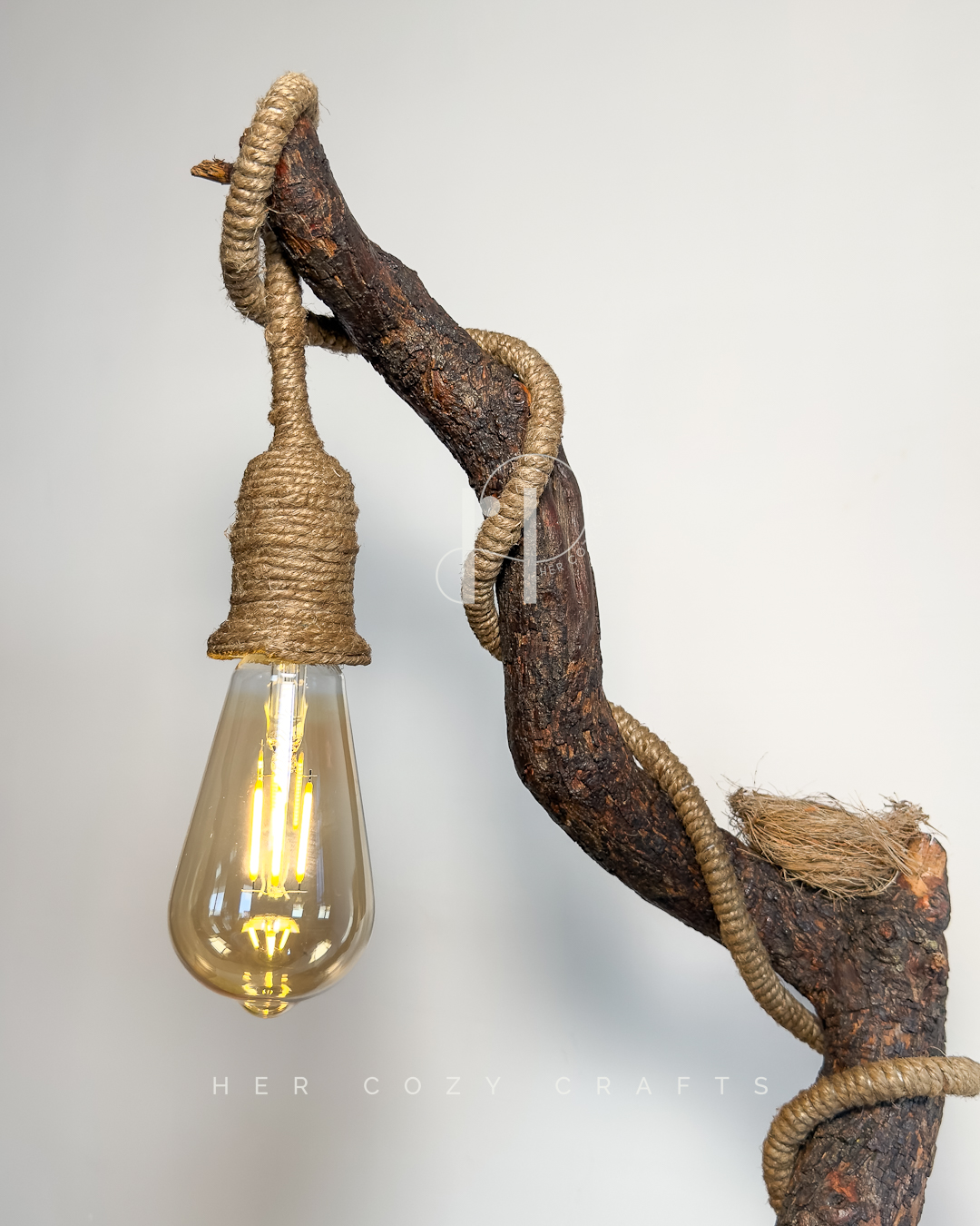 Homestead Curve Lamp - Angled stem over house, pins, and stone walkway - Image 2