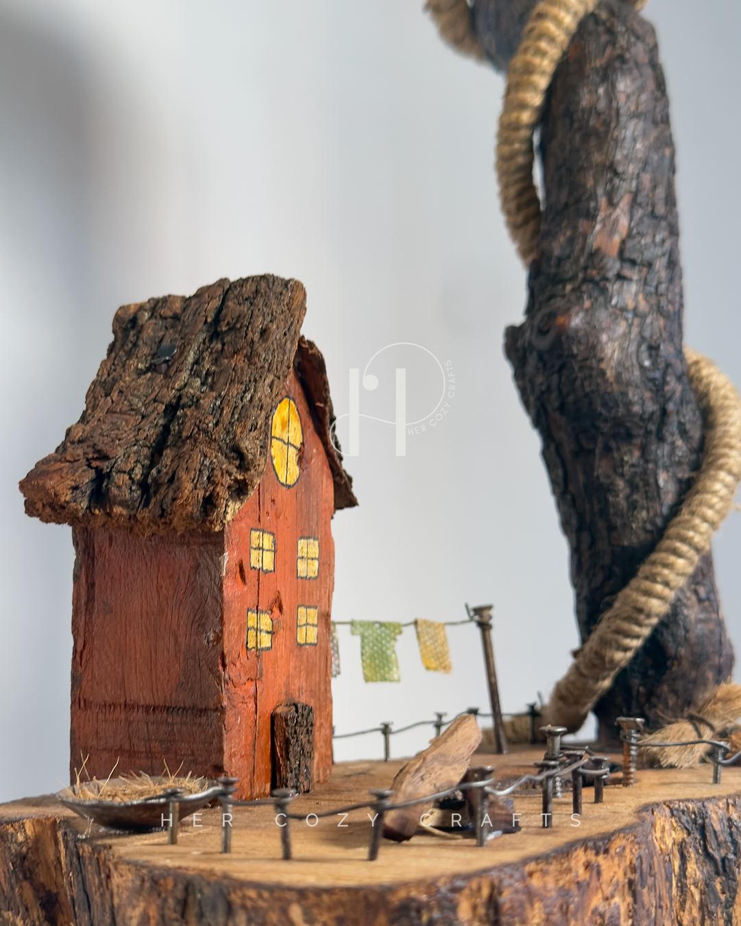 Homestead Curve Lamp - Angled stem over house, pins, and stone walkway - Image 8