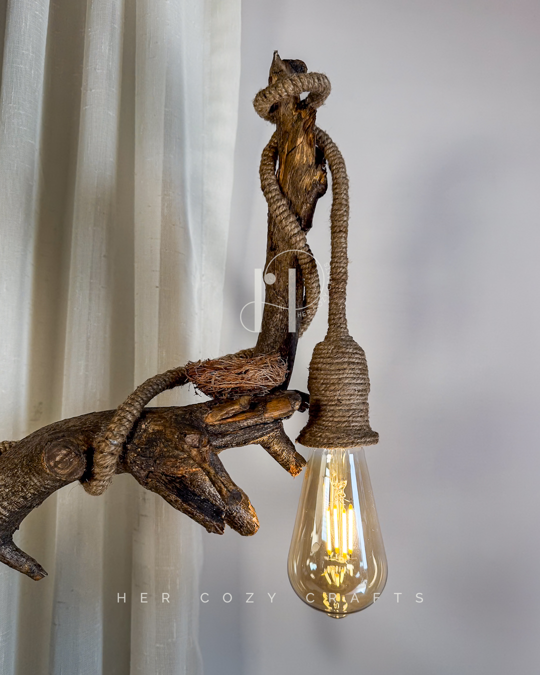 Hook Rise Lamp — Slender branch lifting light over rustic yard - Image 2